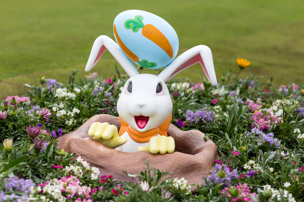 An Easter inflatable product placed outdoors on the grass.