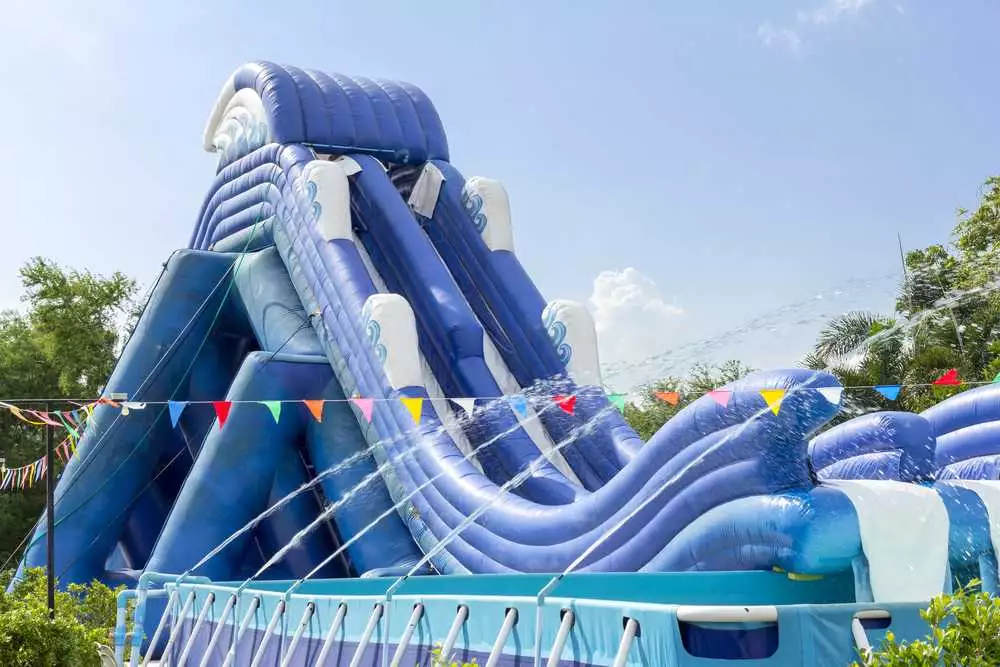 A large outdoor inflatable water slide.